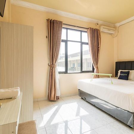 Urbanview Hotel Nugraha Palembang By Reddoorz Exterior photo